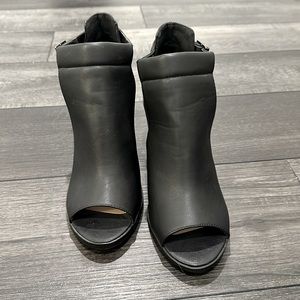 Black Soda Booties with open toe. Size 8.5.